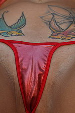 Tattoed chippy in hot red bikini  10