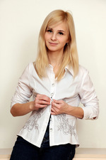 Petite blonde beauty Violeta smiles sweetly in her white blouse and black pants 02